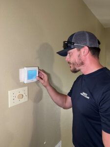 Plumber servicing home in College Station
